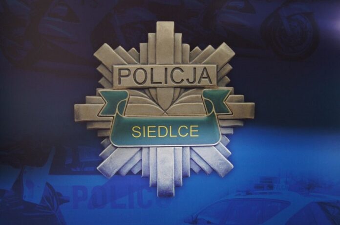 Logo policji na granatowym tle